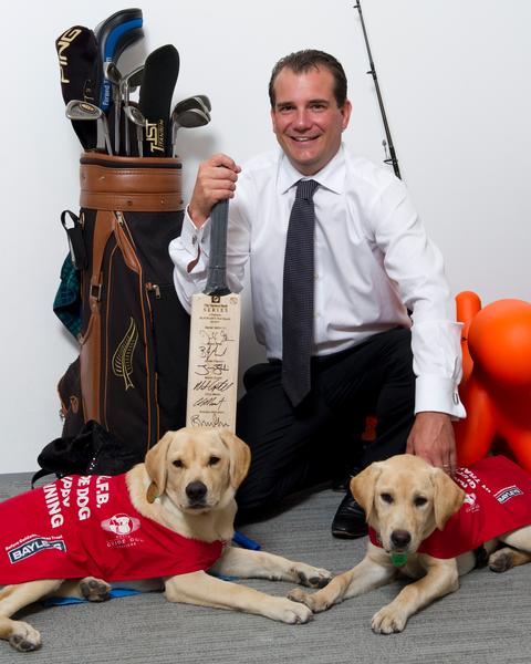 Mike Bayley with guide dogs